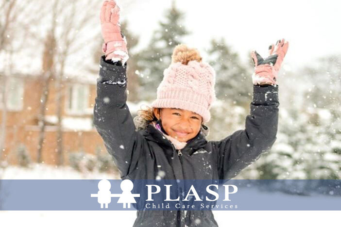 Picture of a child throwing snow in the air